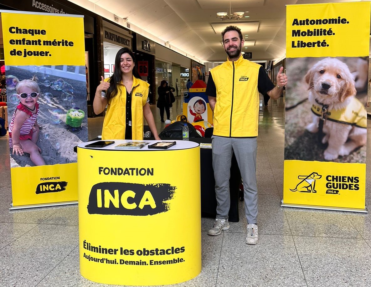 Two canvassers soliciting for monthly donation at a mall in Quebec