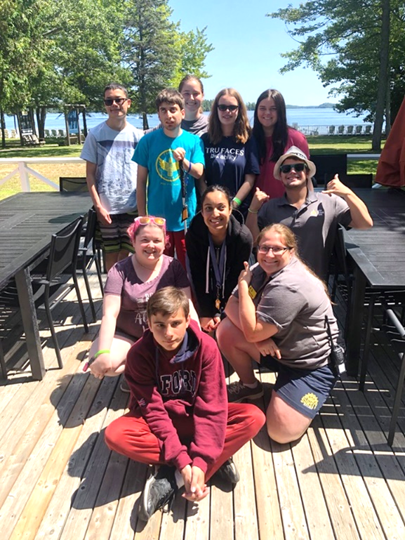 Counsellors-in-Training team posing on the CNIB Lake Joe patio