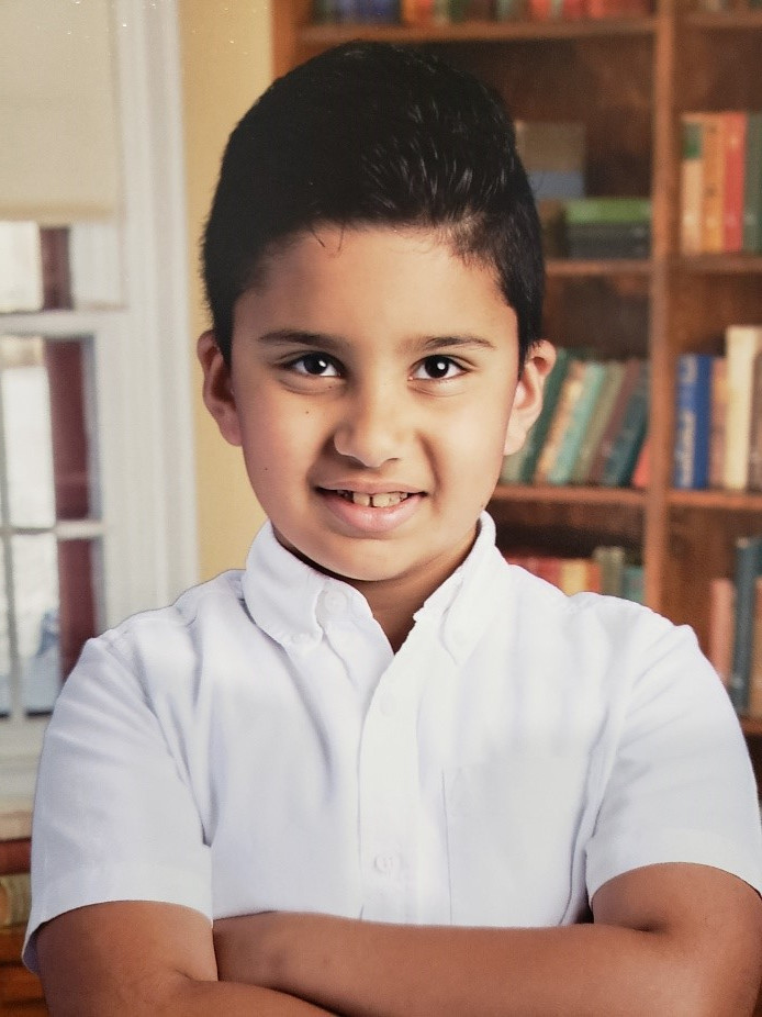 Ali Zaben, 9 ans, pose pour une photo d'école. 