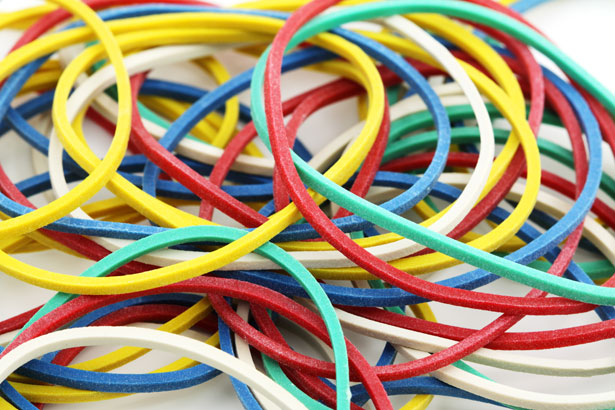 Pile of brightly coloured elastic bands 