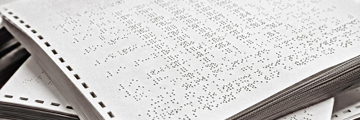 A stack of braille materials