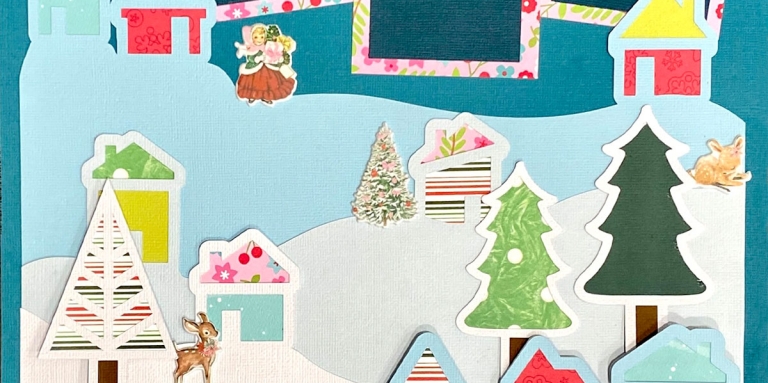 A scrapbook page with cutouts of Christmas trees, houses in colourful paper, deer, and children.