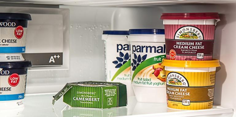 Several food items inside a refrigerator