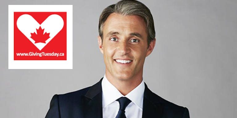 A smiling Ben Mulroney with the Giving Tuesday Canada logo
